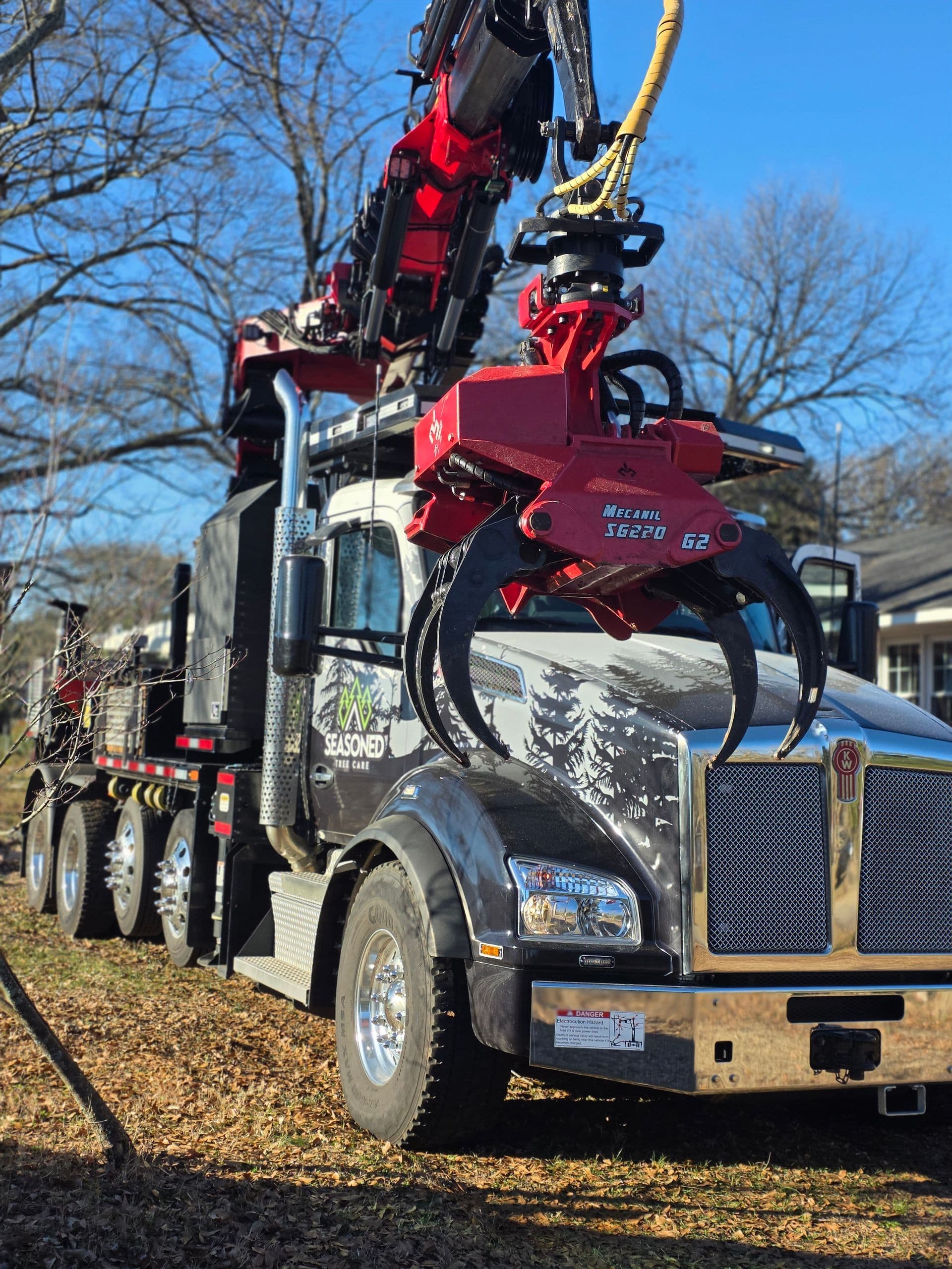 Palfinger crane truck set up for a tree removal in the Upstate
